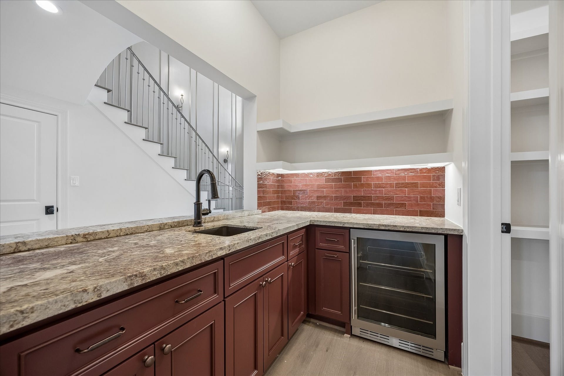 1018 Rosepoint Street, Houston, TX 77018 Wet bar with plenty of storage and wine fridge.