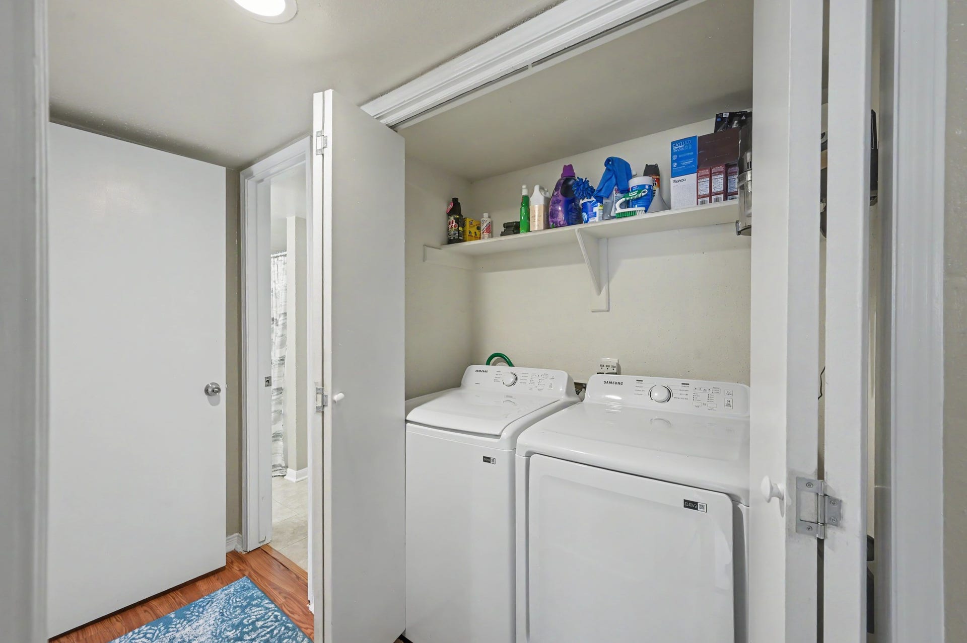 Laundry closet in downstairs hall