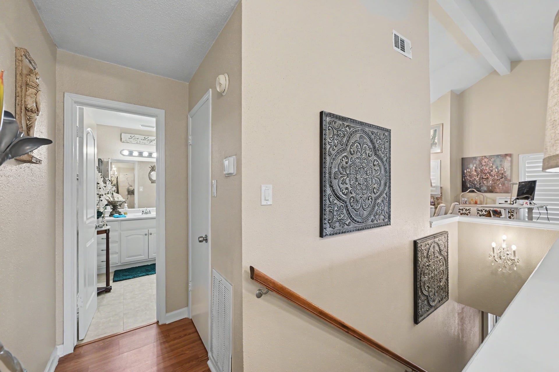 As you head upstairs, youll find another full bathroom to your right, along with a convenient storage closet for added functionality.