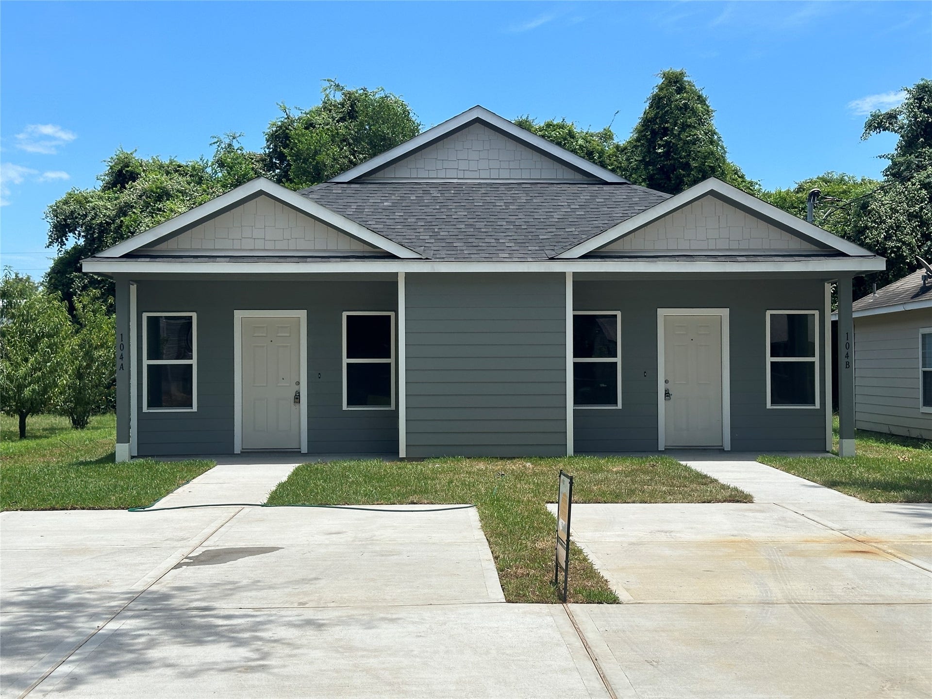 104 Turner Drive, Willis, TX 77378 Welcome home to this well-appointed new construction duplex featuring separate entrances and dedicated driveways for each unit.