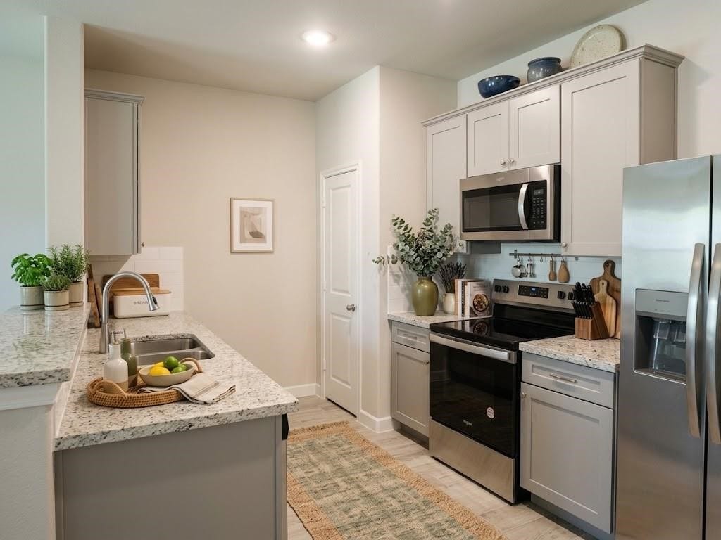 104 Turner Drive, Willis, TX 77378 Sleek granite countertops.