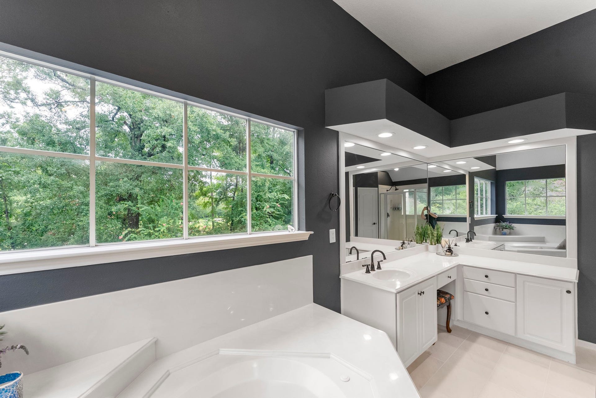 66 Candle Pine Place, The Woodlands, TX 77381 There are separate vanities offering extra space.