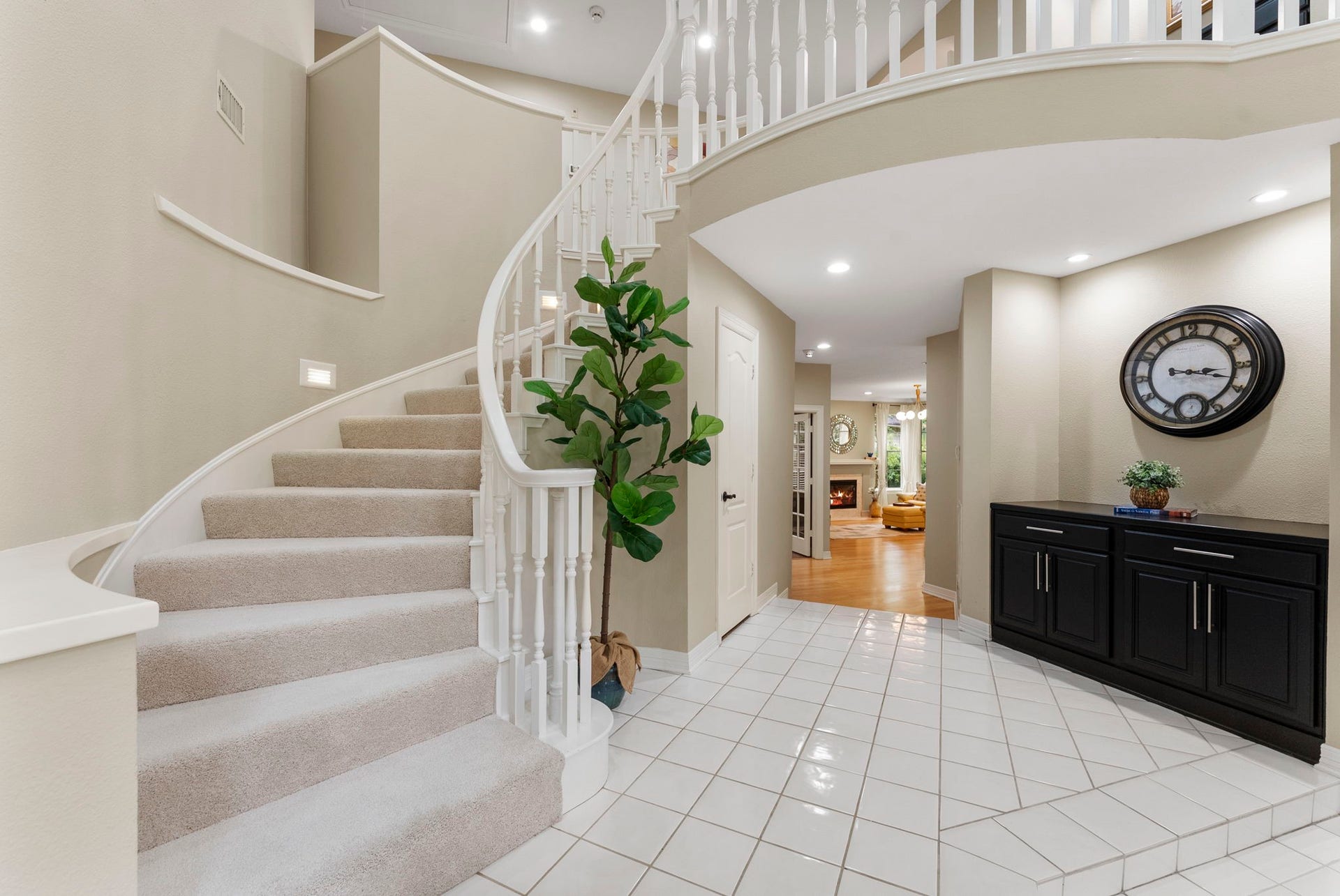 66 Candle Pine Place, The Woodlands, TX 77381 The gorgeous spiral staircase and second floor has new carpet.