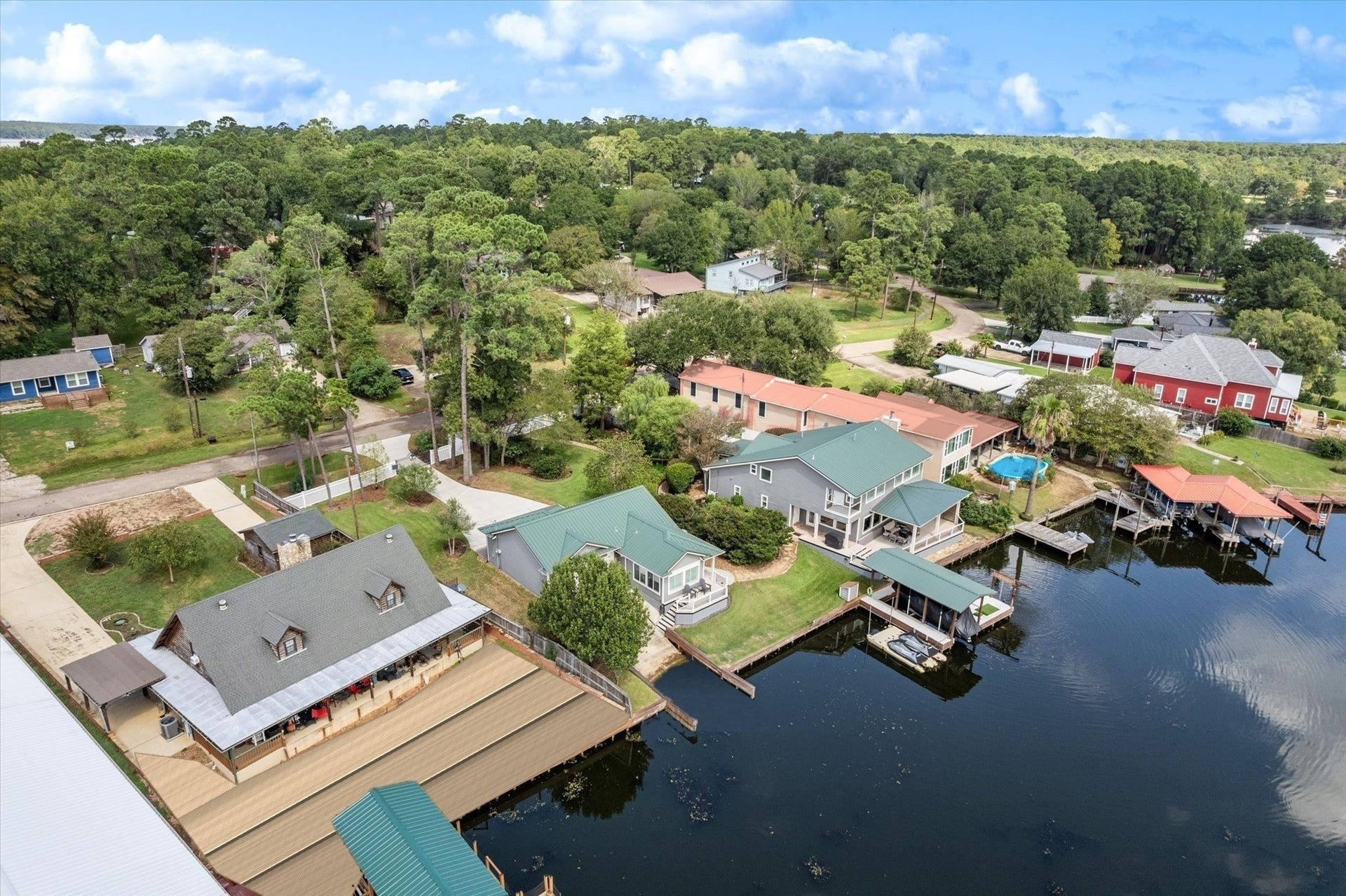 16372 Lochness Dr Drive, Willis, TX 77318 22,000 acres of Protected National Forest abuts to the neighborhood. No busy streets on this peninsula
