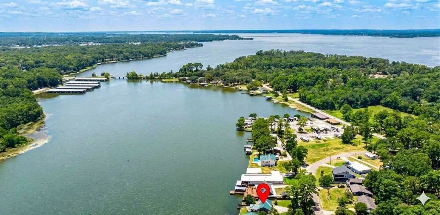 16372 Lochness Dr Drive, Willis, TX 77318 Located on an "arm" on Deep water original lakebed with unrestricted flow