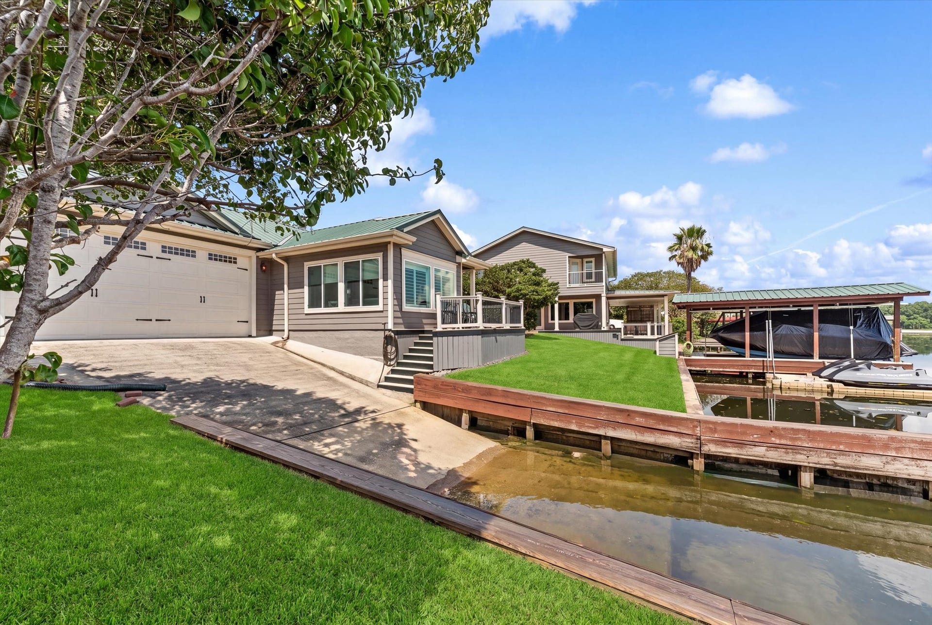 16372 Lochness Dr Drive, Willis, TX 77318 Drive Through Garage with Private Boat Ramp