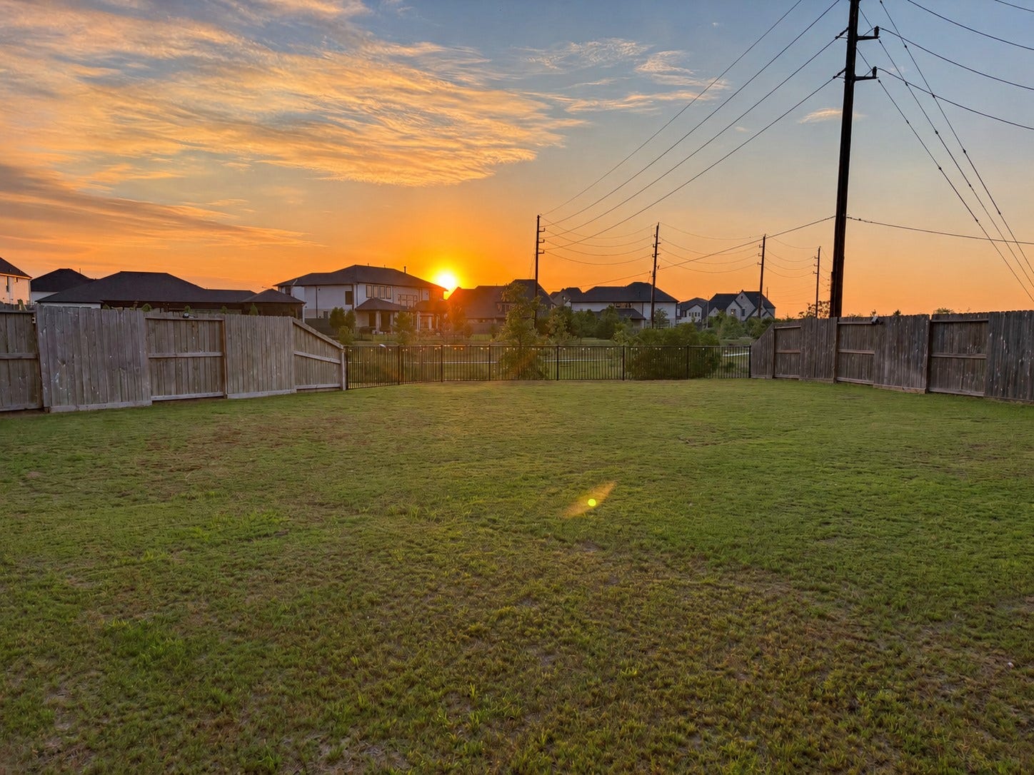 18. Sunset views from the spacious backyard.