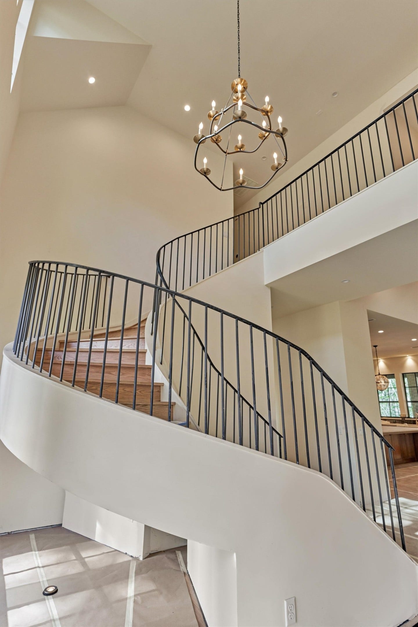 4800 Hawk Canyon Court, Montgomery, TX 77316 The floating spiral staircase represents a true architectural statement.