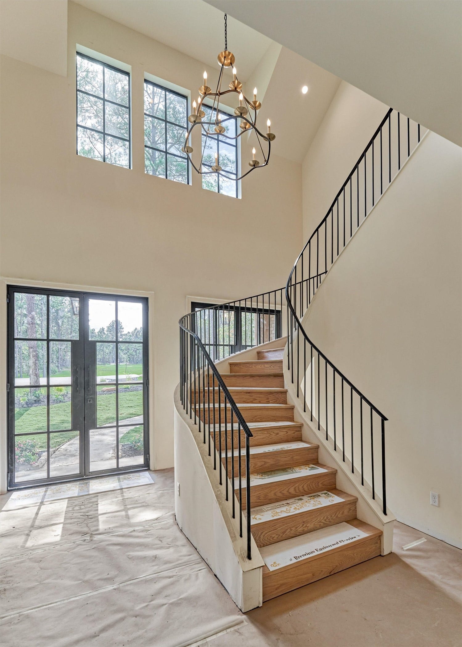 4800 Hawk Canyon Court, Montgomery, TX 77316 The floating spiral staircase represents a true architectural statement.