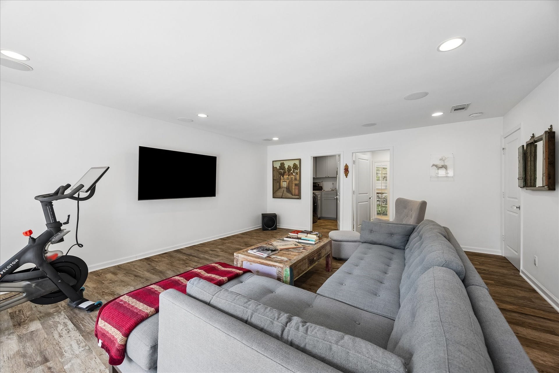 4703 Banning Drive, Houston, TX 77027 Den provides a great room for relaxing, entertaining or enjoying movie nights. Features include recessed lighting, wood flooring & convenient access to the utility room, nearby half bath & additional living spaces.