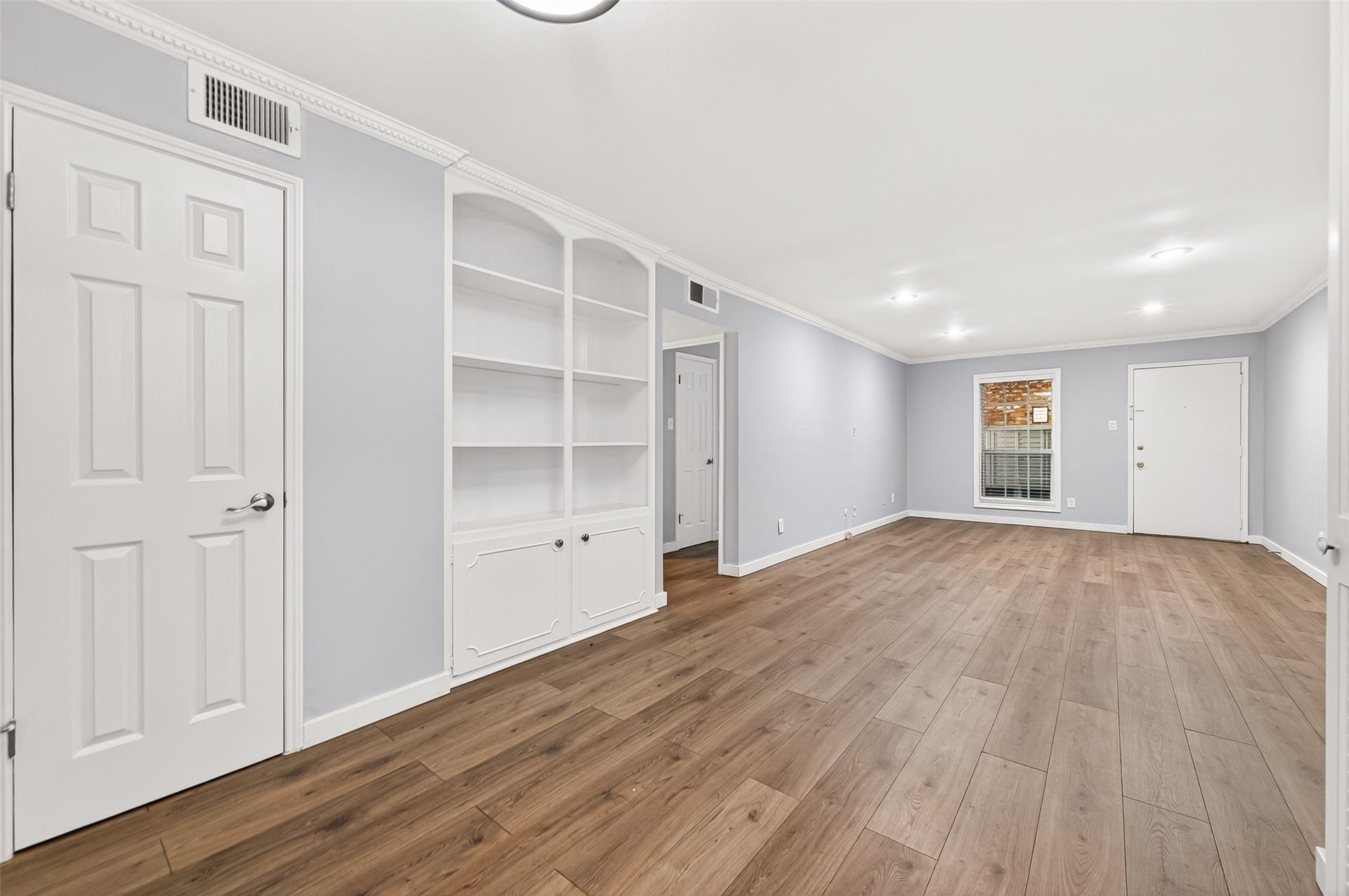 359 N Post Oak Lane, #127, Houston, TX 77024 The Dining Room Has Large Built In Storage With Open Shelving At The Top And Hidden Storage At The Bottom.