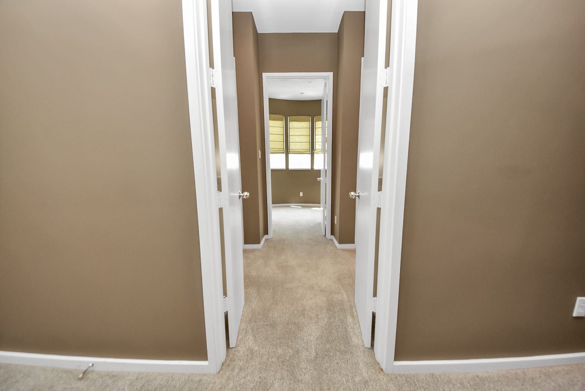 6519 Durford Street, Houston, TX 77007 Private hallway leading to the third-floor study, creating a quiet and refined workspace retreat.