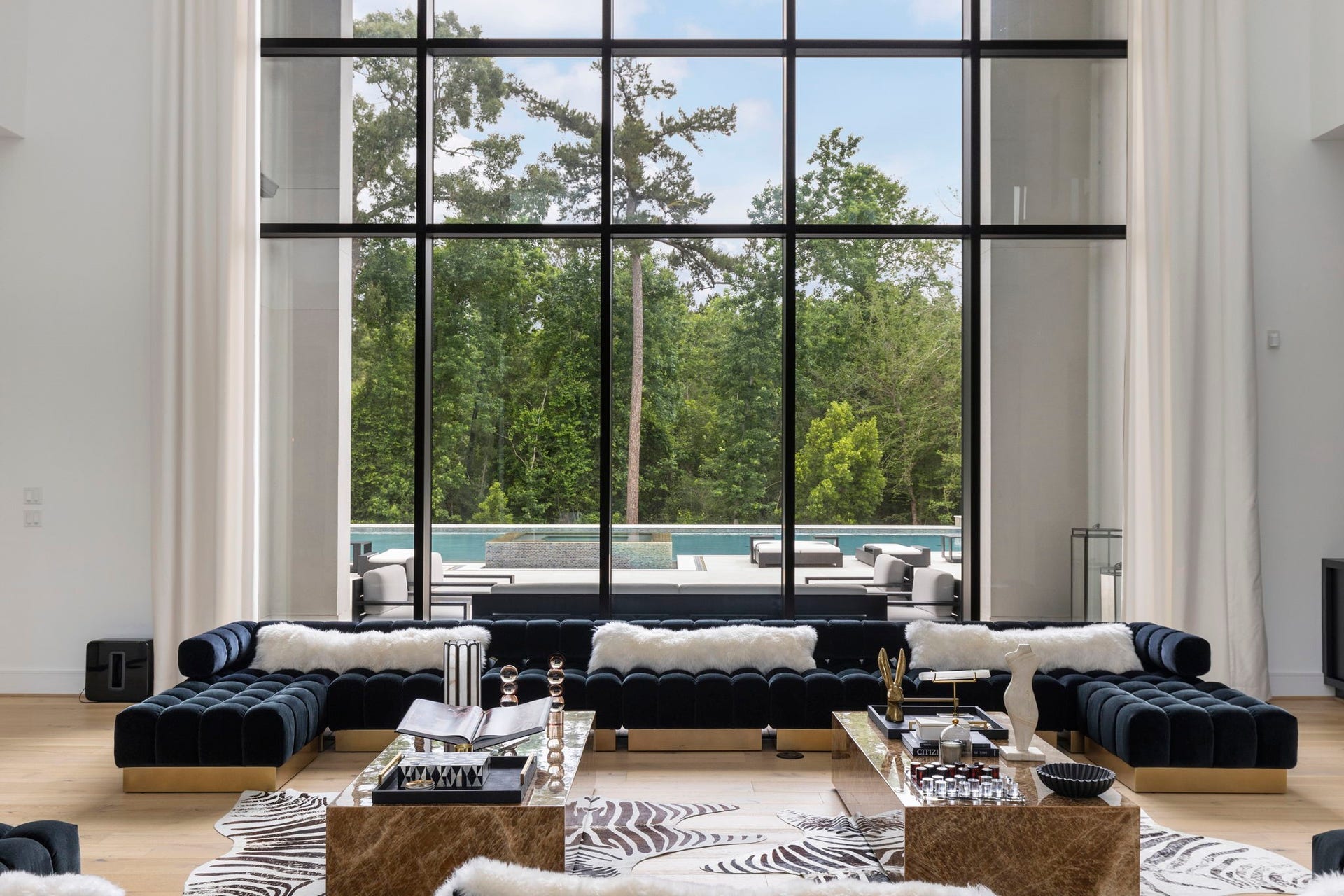 A seamless connection to the outdoors makes this an exceptional setting for both grand entertaining and relaxed everyday living.
