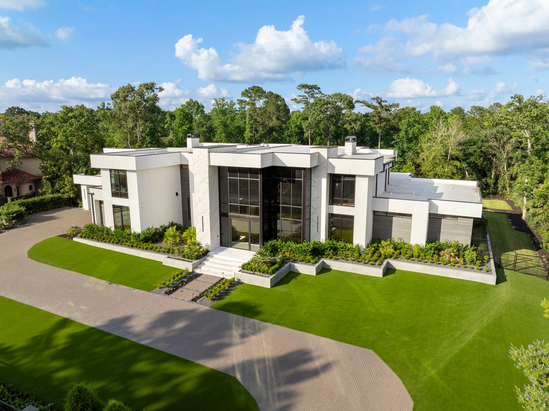 This impressive estate spans over 13,000 square feet of living and entertaining space.