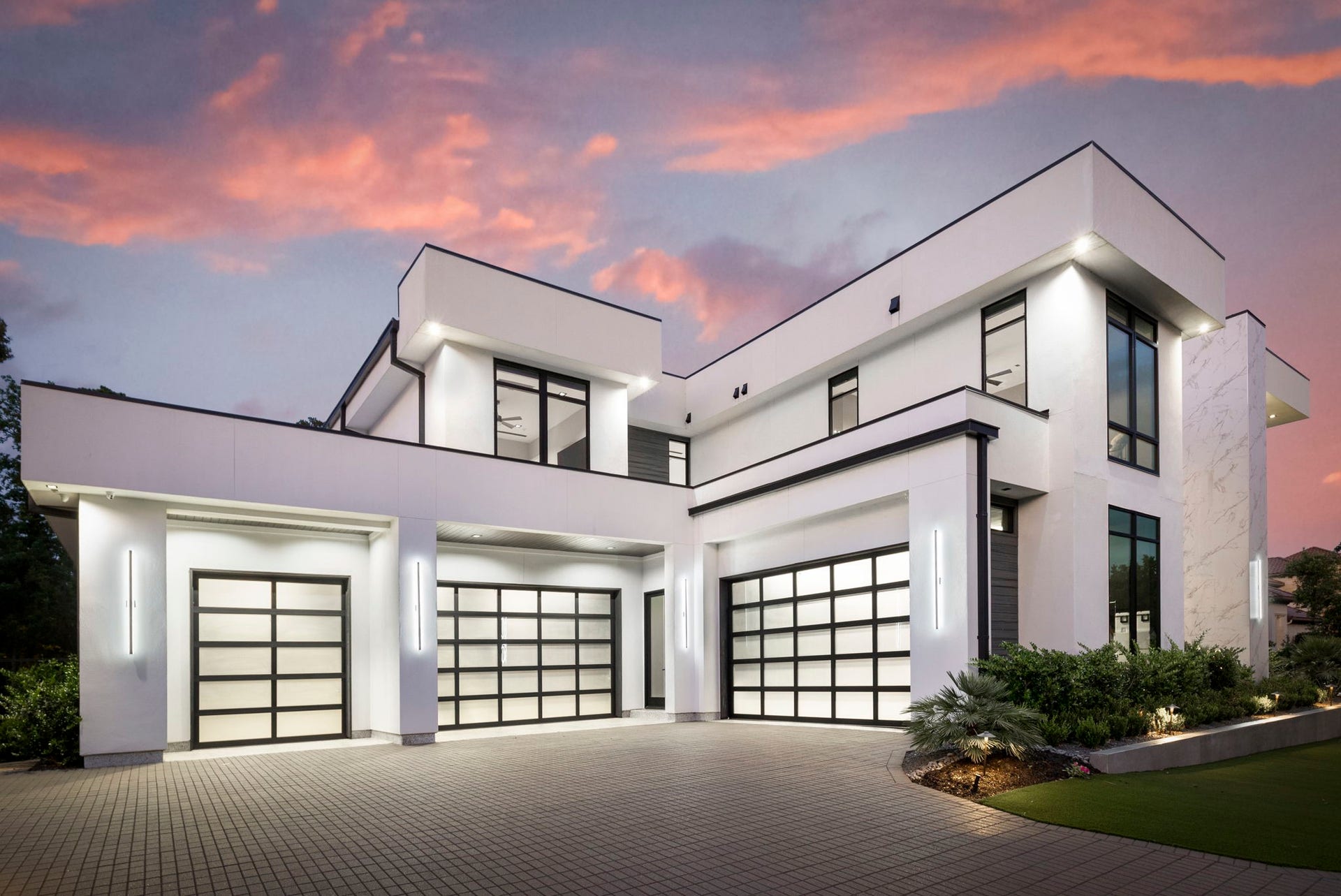 Beautifully finished garages are home to 5 bays, scaled for vehicle lifts, allowing for expanded collection capacity.