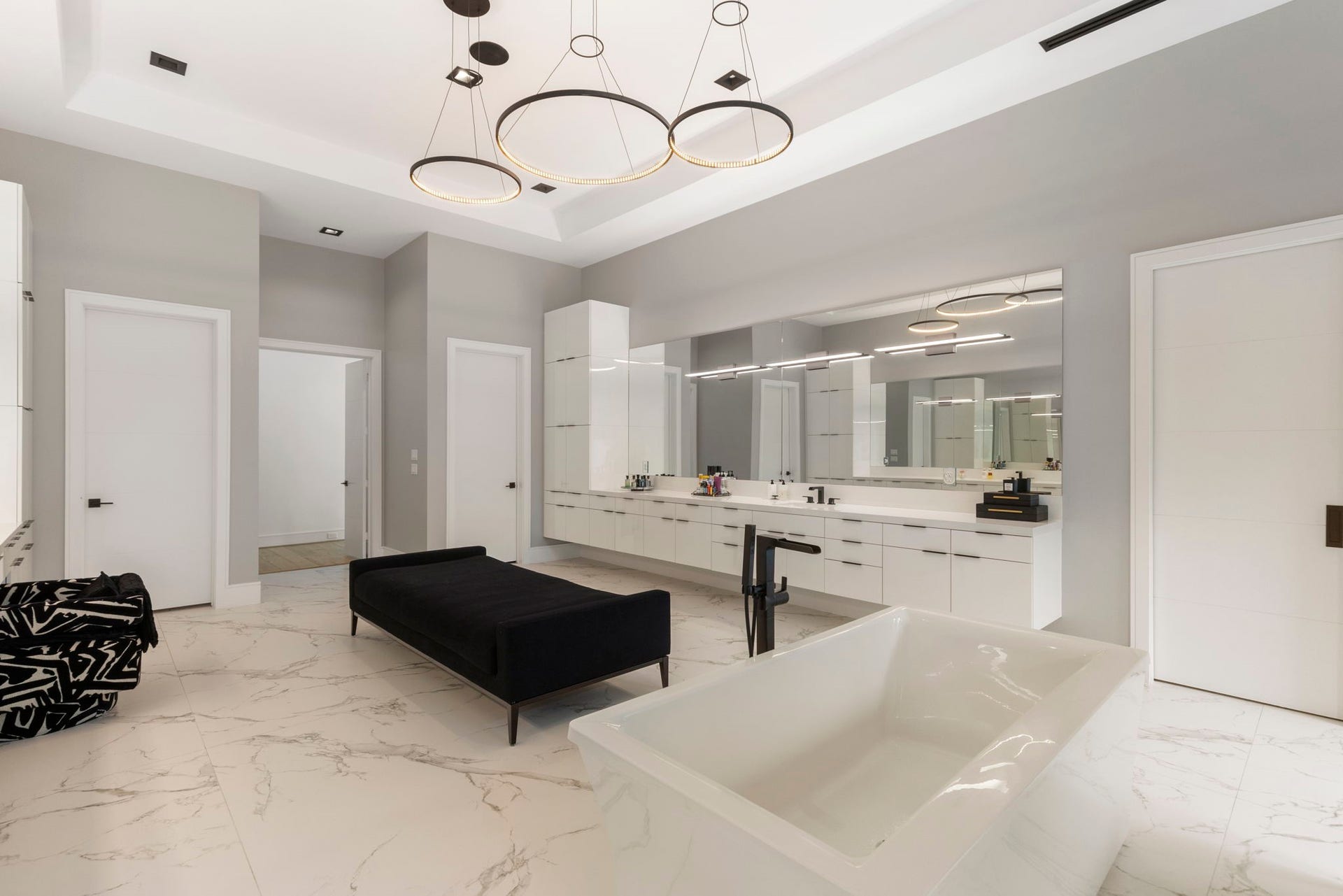 The primary bath is a serene private sanctuary.