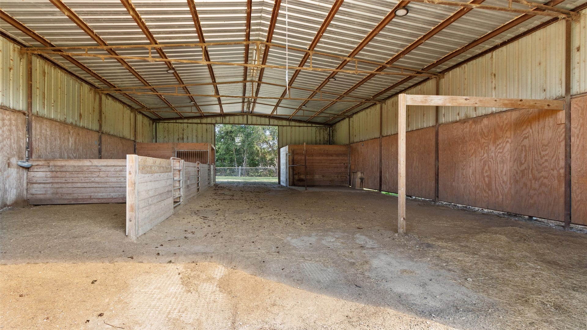 12335 2nd Street, Santa Fe, TX 77510 60x40 barn with three 12x12 stalls