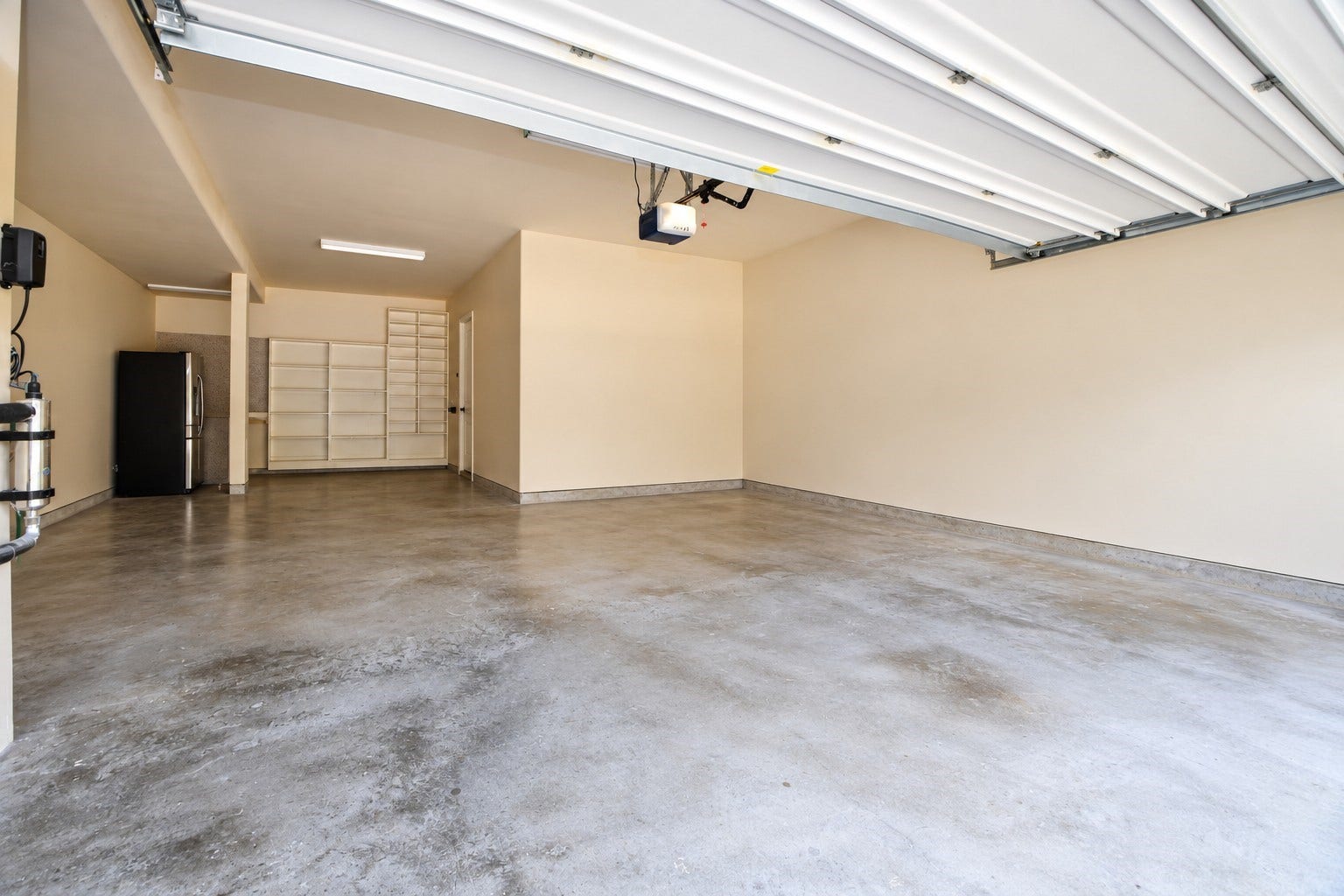 26727 Cedardale Pines Drive, Katy, TX 77494 3 car garage with 5 ft extension, garage door opener, shelving, 2nd fridge for convivence...