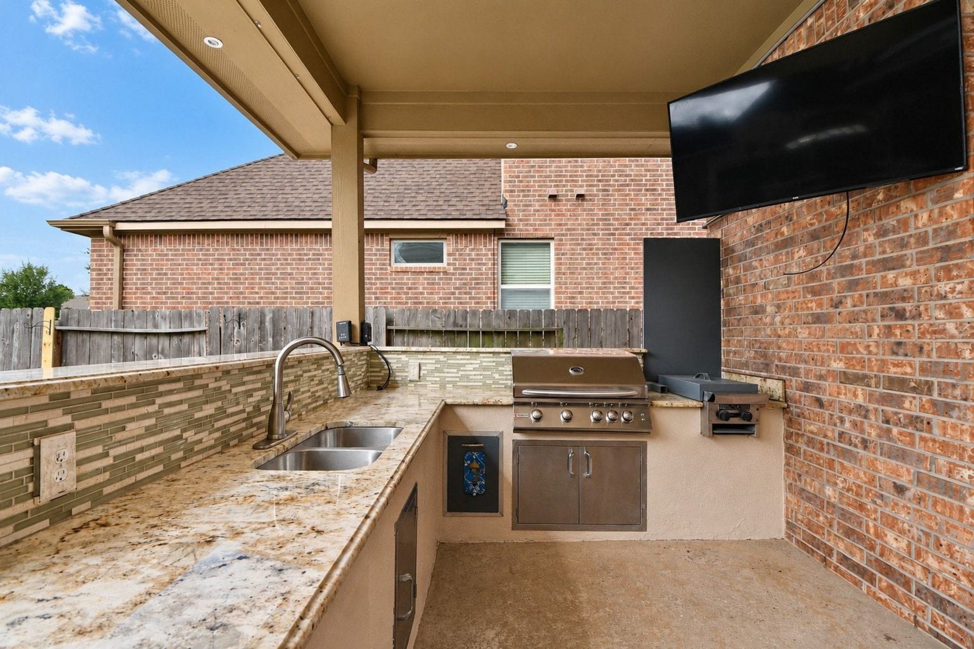 26727 Cedardale Pines Drive, Katy, TX 77494 Great Outdoor Kitchen and covered patio area.