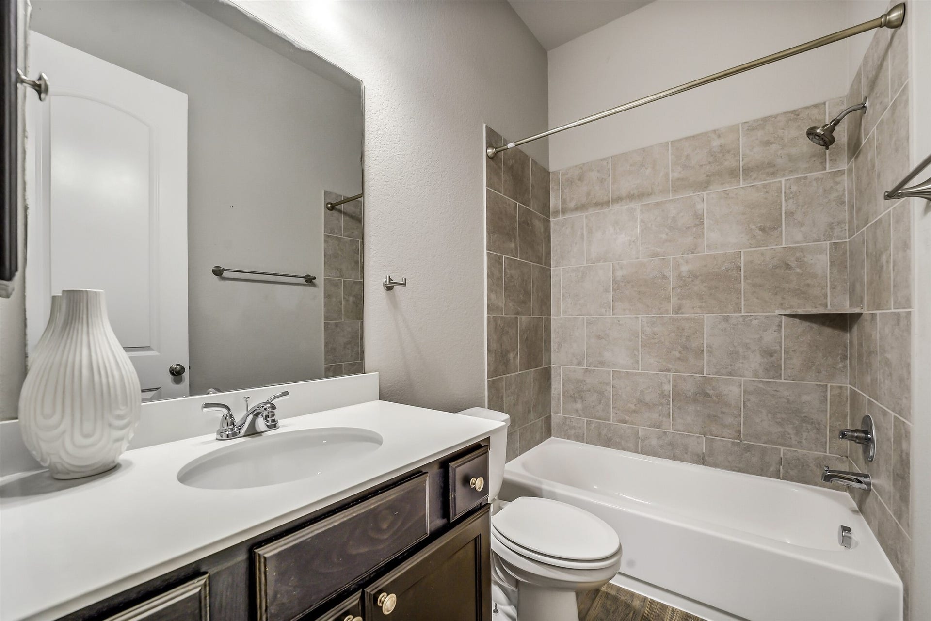 16818 Headwaters Forest Drive, Humble, TX 77346 Secondary full bath with a spacious vanity, tub/shower combination, and neutral finishes designed for comfort and convenience.