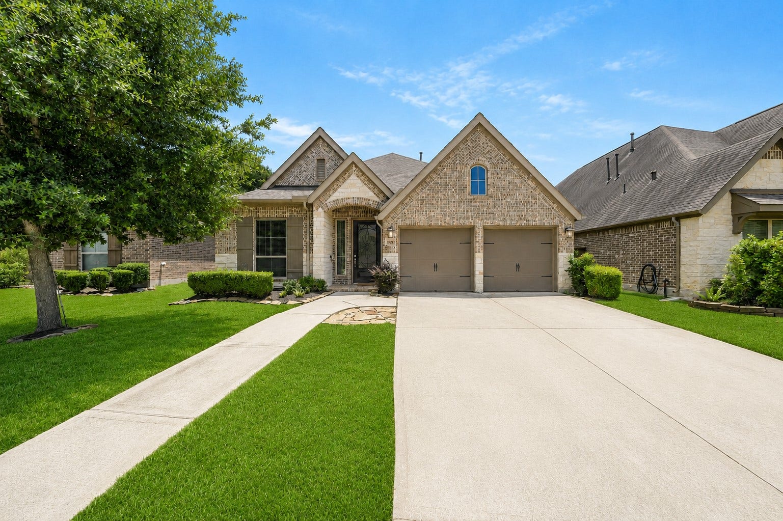 16818 Headwaters Forest Drive, Humble, TX 77346 Welcome home! Stunning brick and stone exterior with manicured landscaping, covered front porch, and exceptional curb appeal.