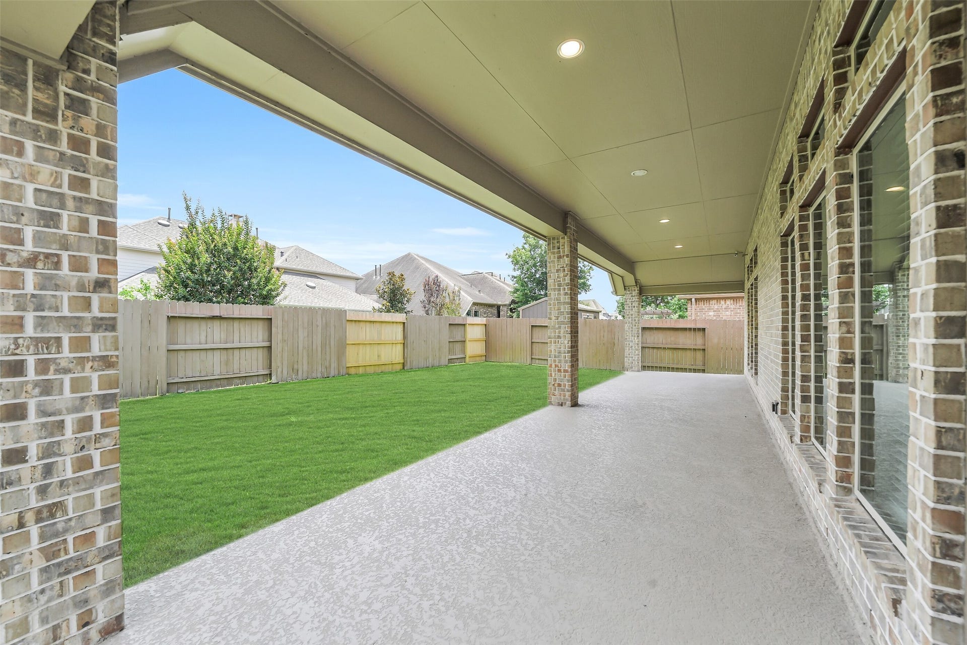 16818 Headwaters Forest Drive, Humble, TX 77346 Enjoy outdoor living year-round on the spacious covered patio overlooking the fully fenced backyard with plenty of room to relax, play, or entertain.