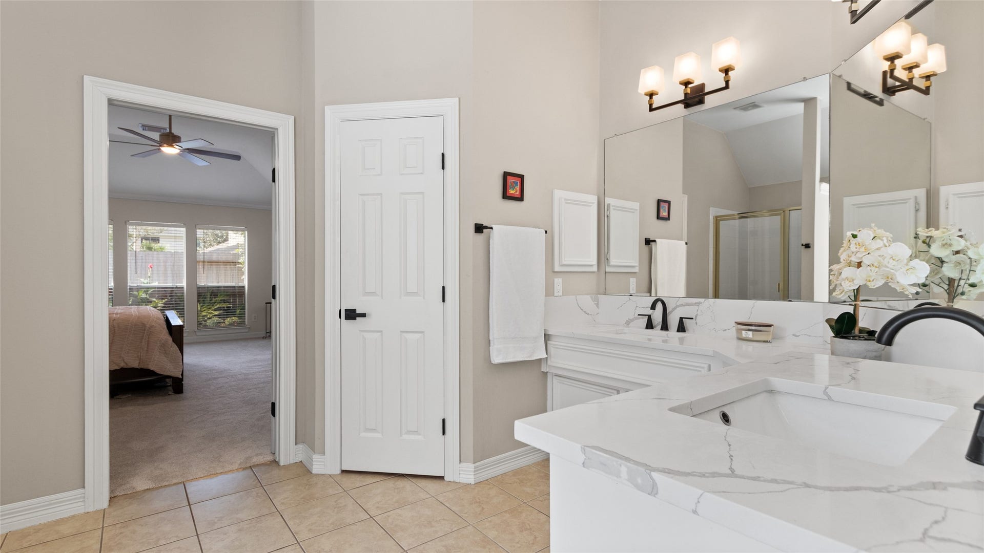 1170 Rustling Wind Lane, League City, TX 77573 The quartz countertops continue in here, as well as updated lighting & fixtures.