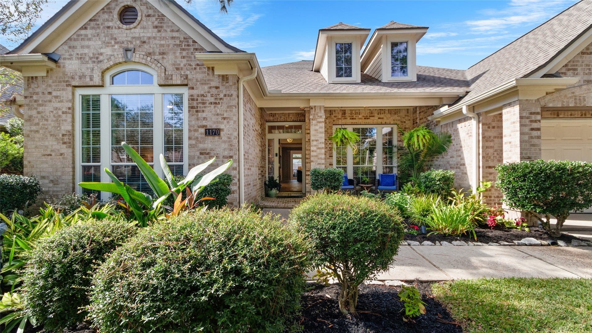 1170 Rustling Wind Lane, League City, TX 77573 This home exudes curb appeal.