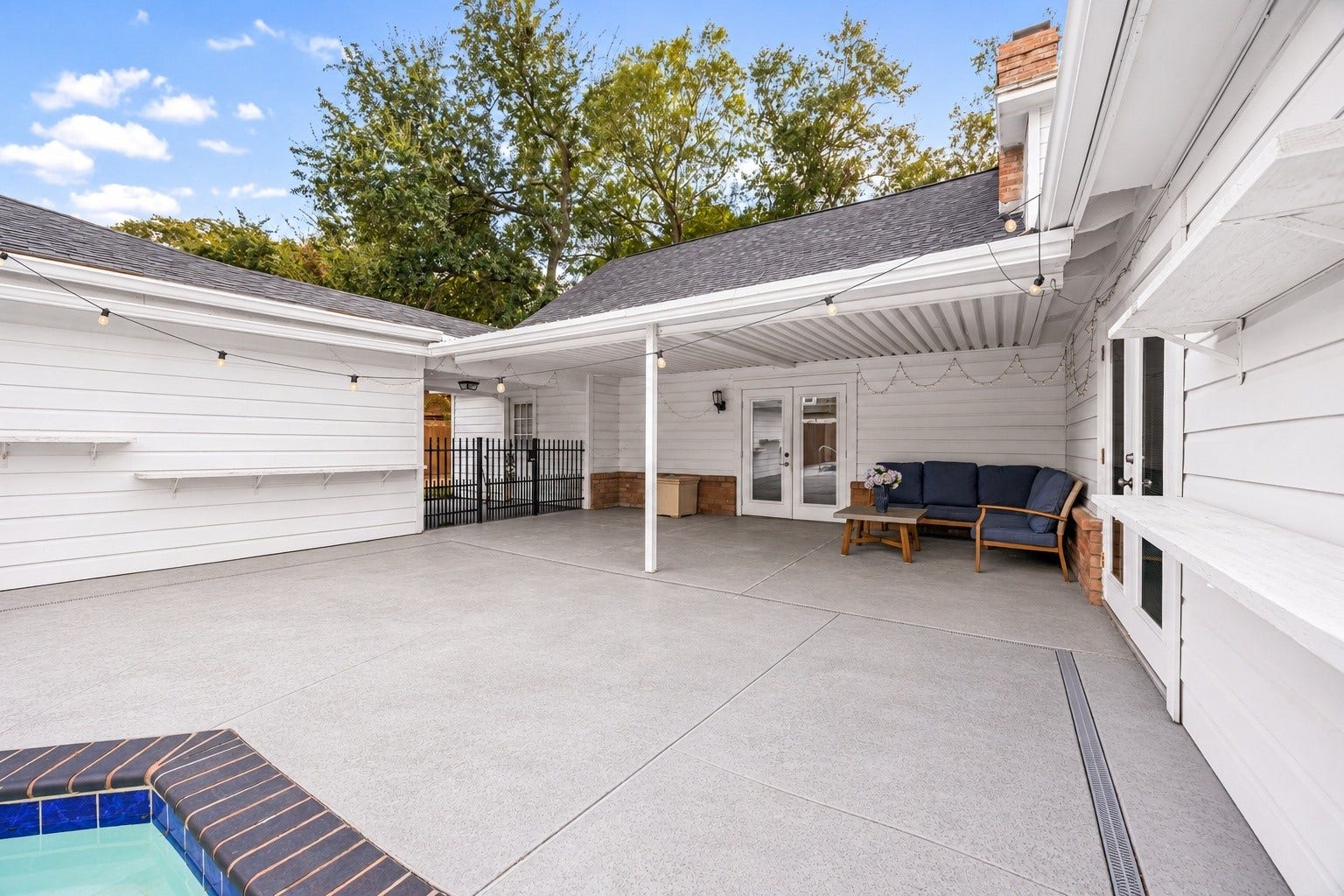 20102 Wickham Court, Katy, TX 77450 Covered patio sits directly off the home and overlooks the pool area.