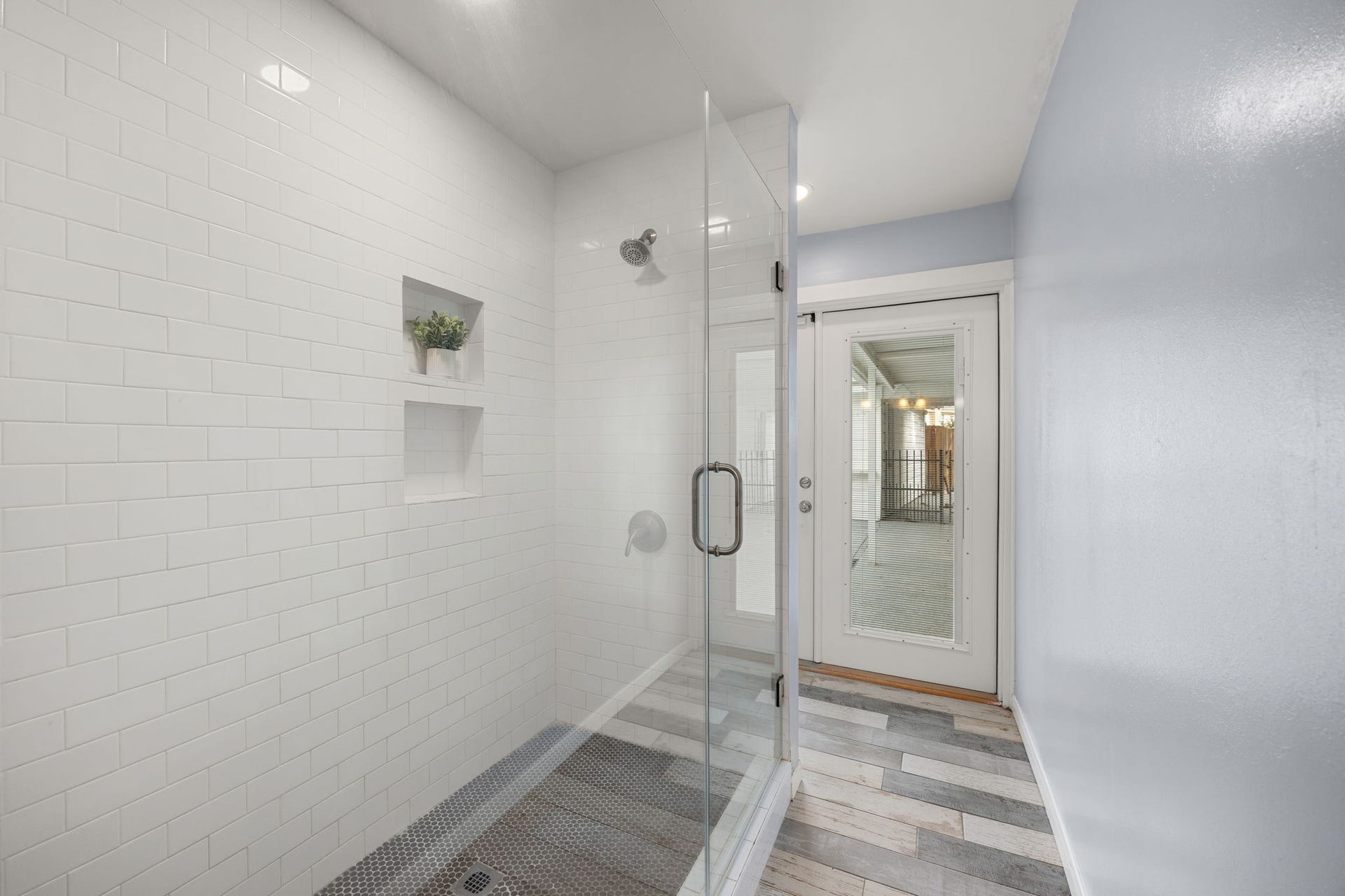20102 Wickham Court, Katy, TX 77450 Large walk-in shower with white subway tile with glass doors