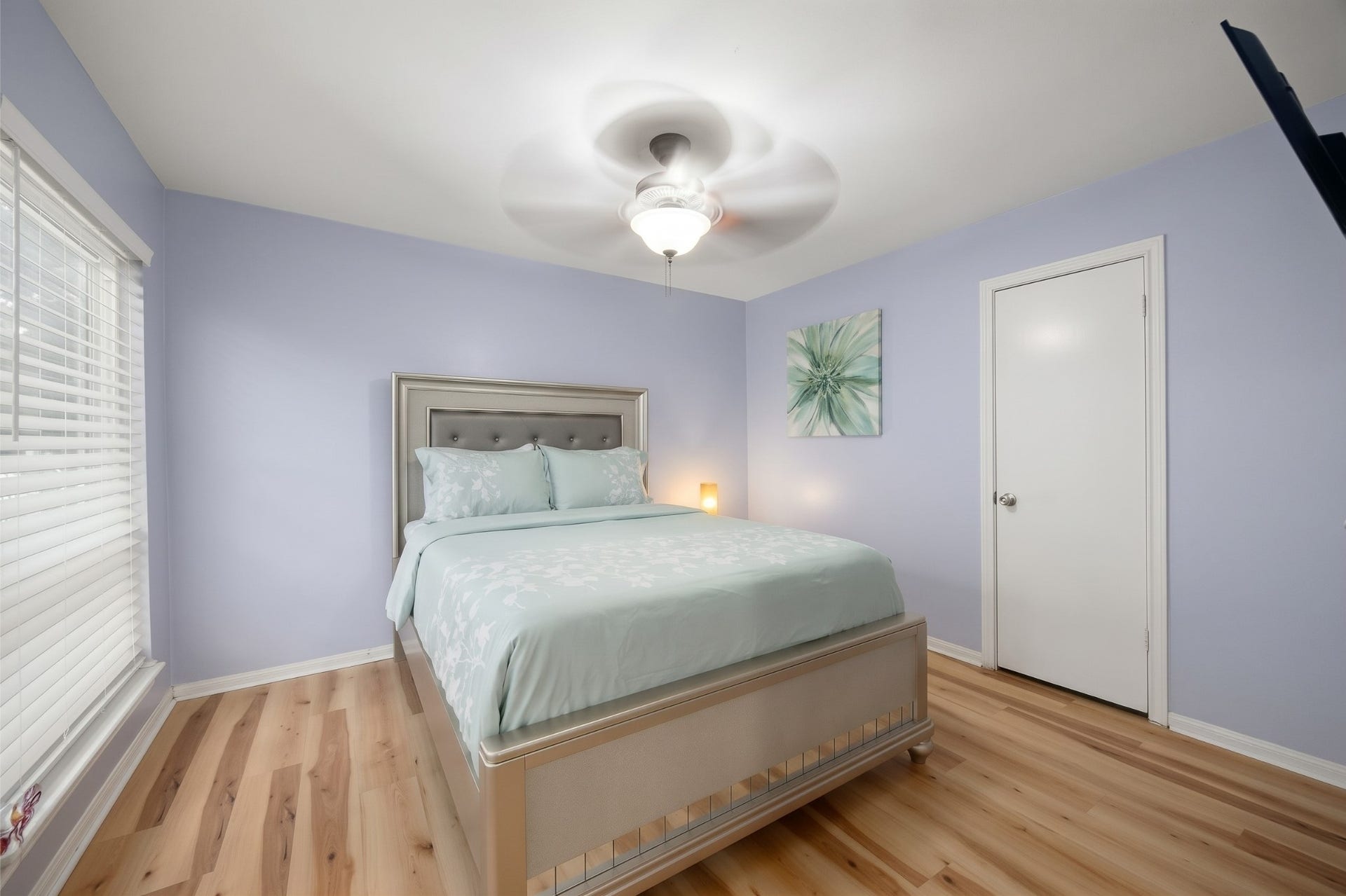 20102 Wickham Court, Katy, TX 77450 Secondary bedroom located downstairs with a window and closet.