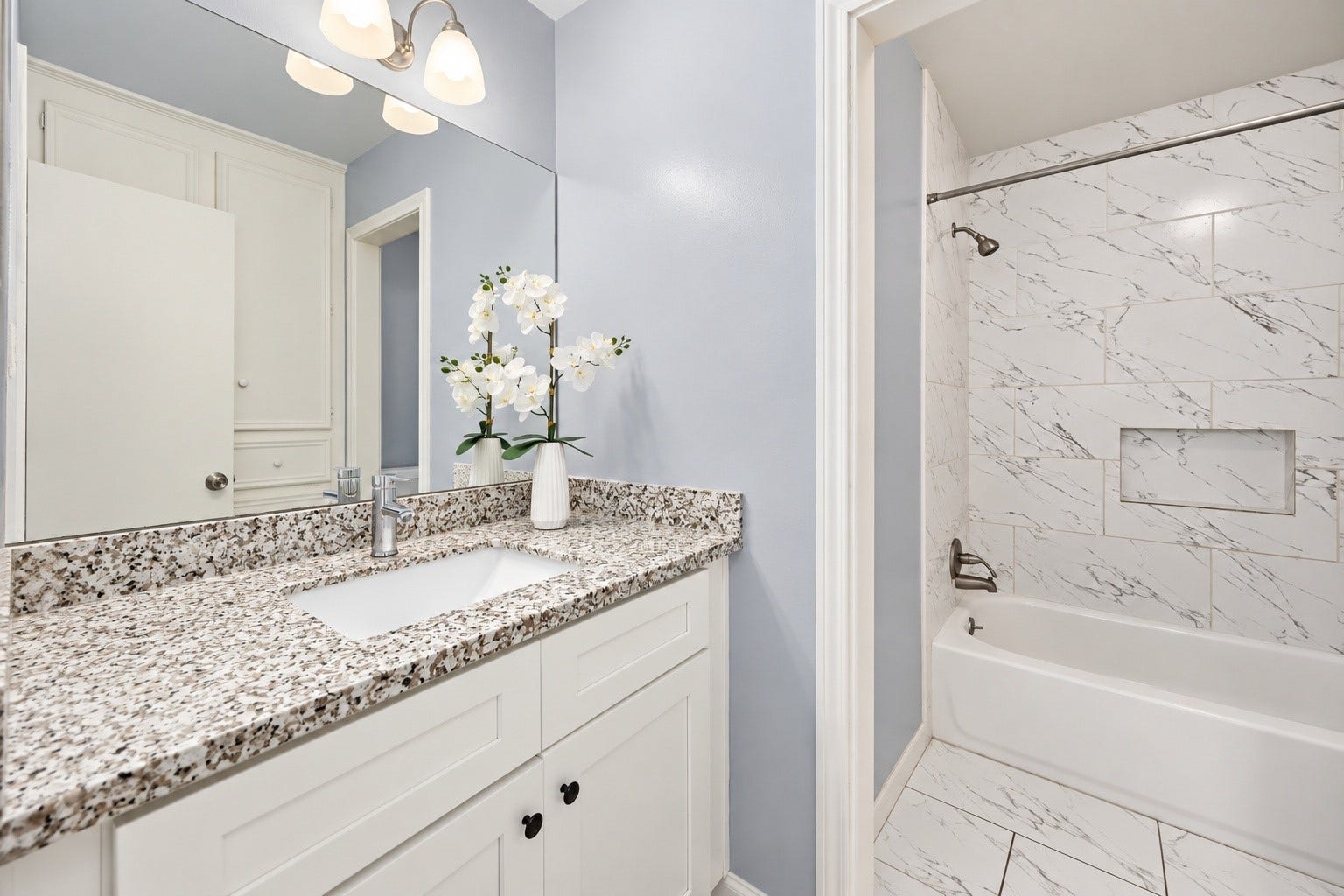 20102 Wickham Court, Katy, TX 77450 Bathroom with granite vanity, double sinks, and a tub