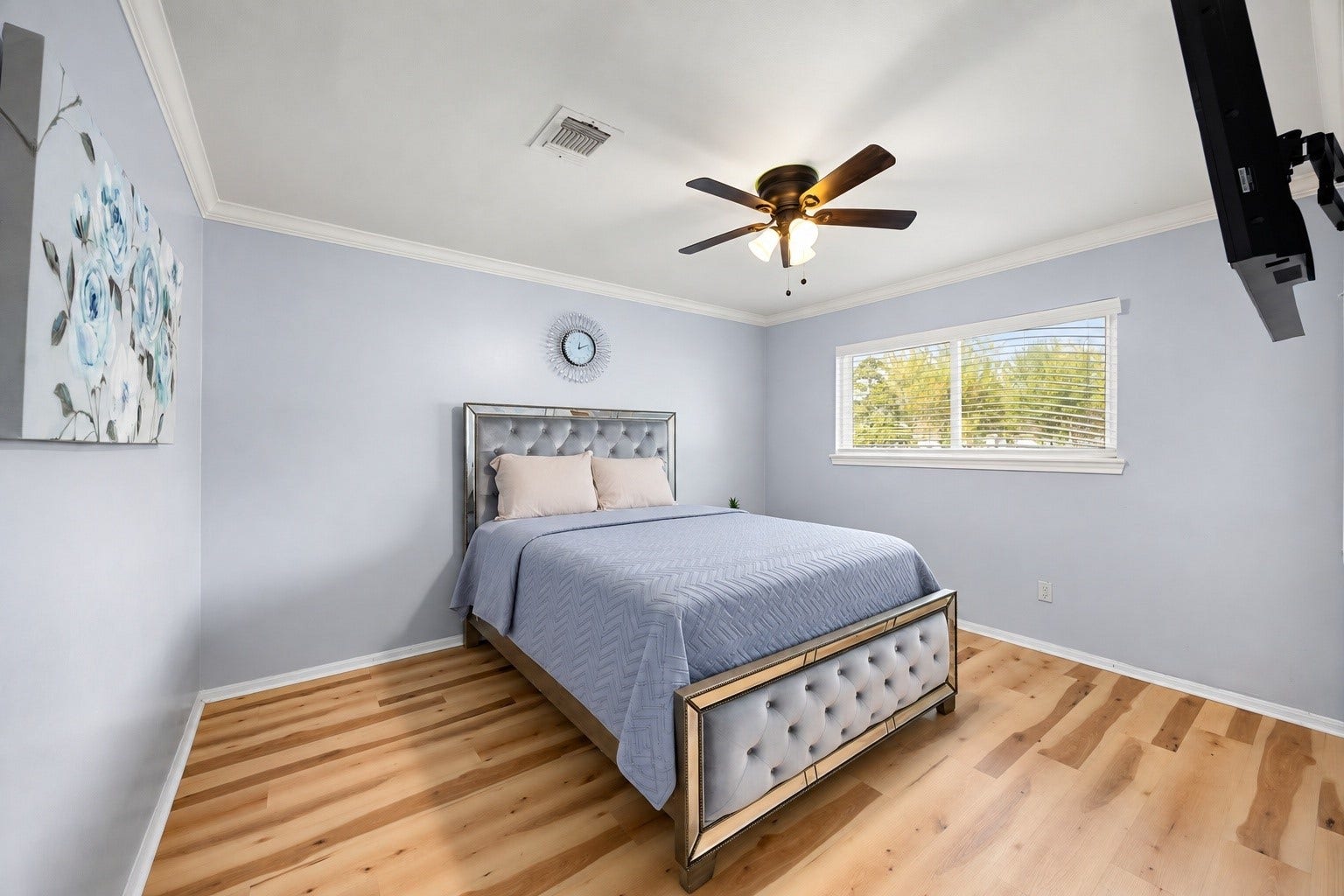 20102 Wickham Court, Katy, TX 77450 Secondary bedroom with hardwood floors, a ceiling fan, and a large window
