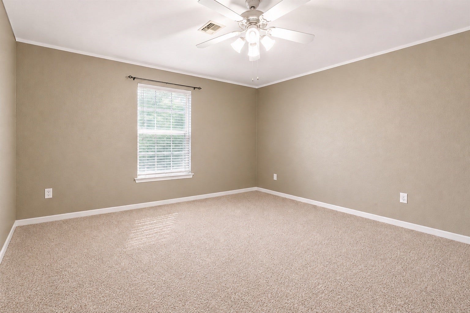 14907 E Lime Blossom Court, Cypress, TX 77433 This spacious secondary bedroom offers comfortable accommodations for family members or guests.