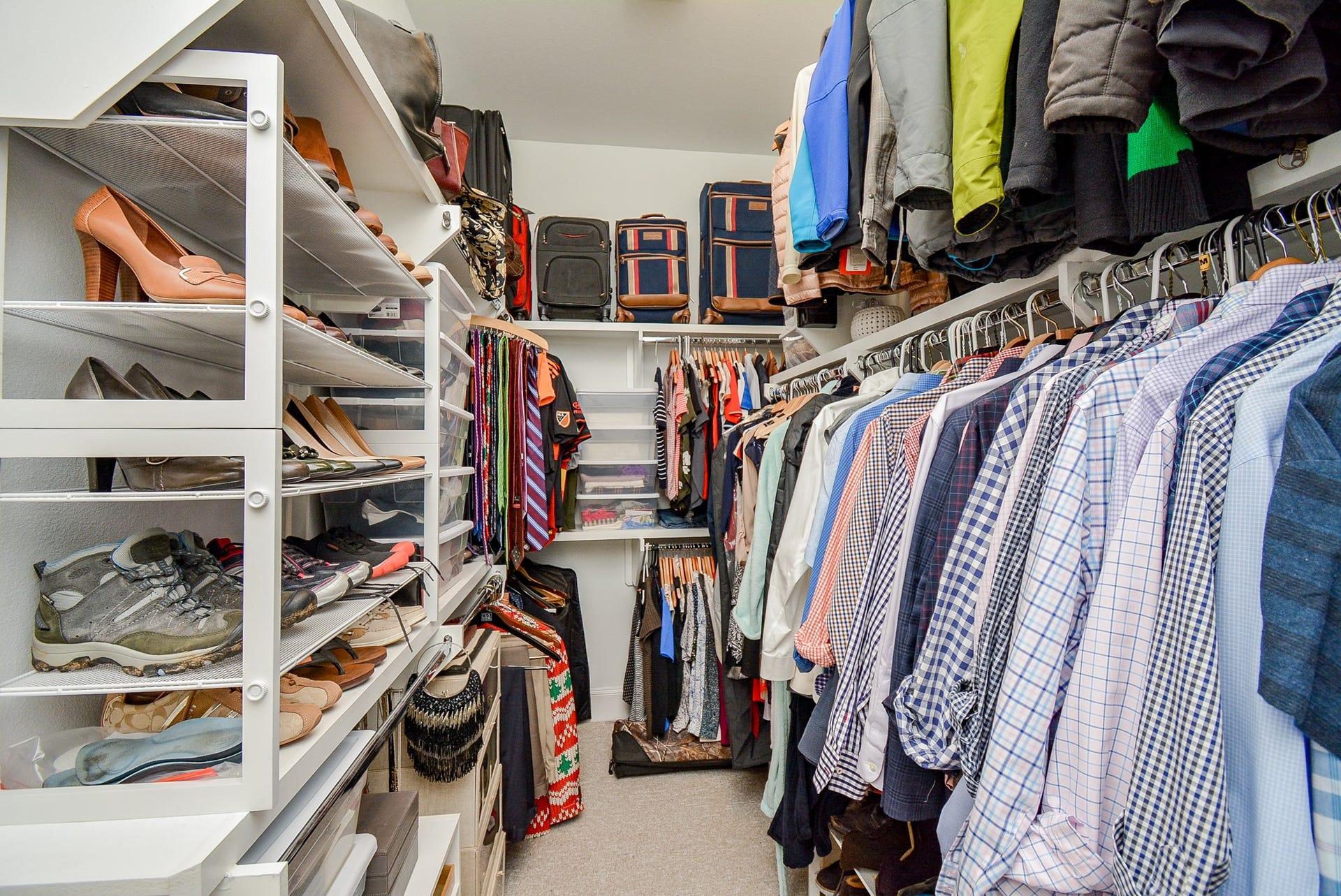 615 Nagle Street, Houston, TX 77003 Primary bedroom walk in closet with built in shelving