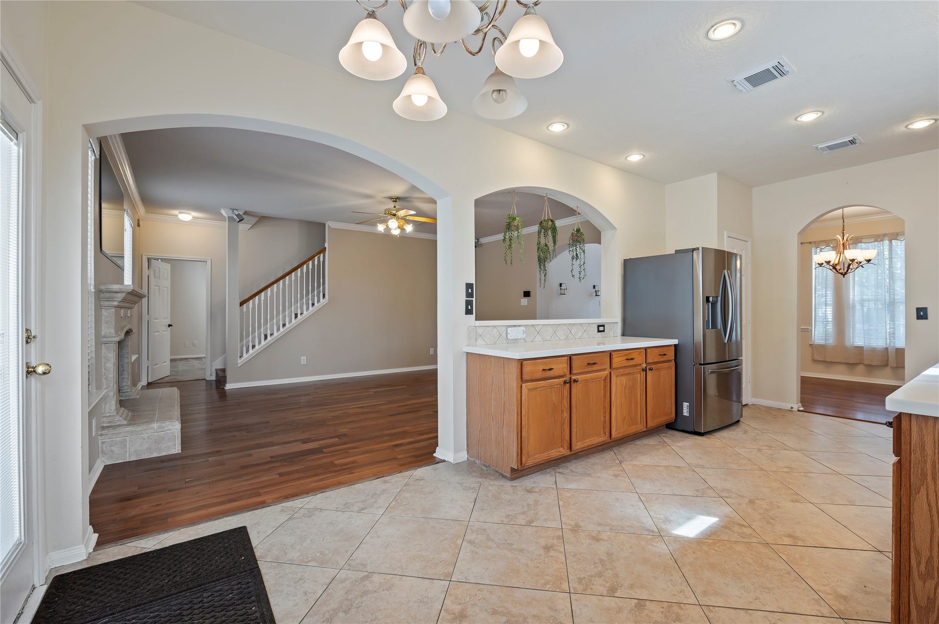 The kitchen also opens to the living room.