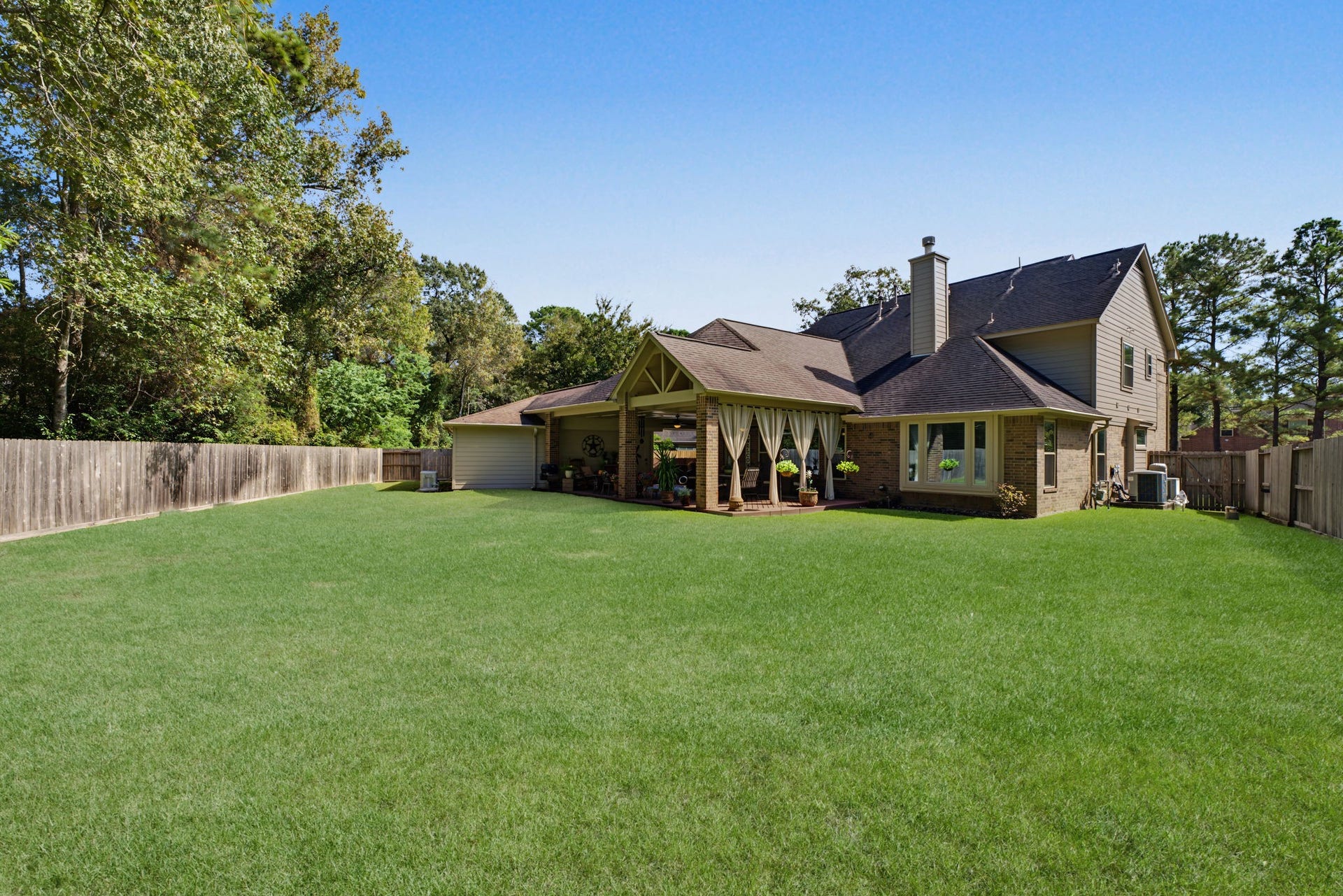 4807 Stonecrop Court, Houston, TX 77345 HUGE backyard! If you wanted to add a pool, you would have plenty of grass space left over.