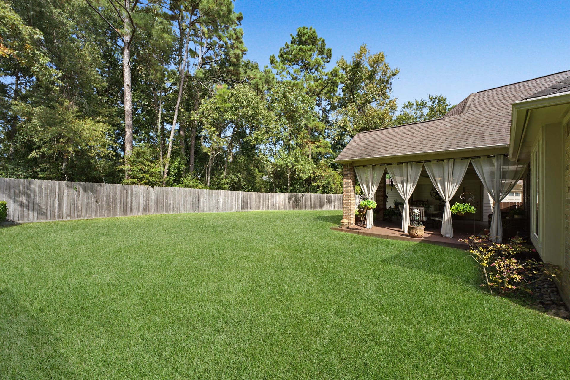4807 Stonecrop Court, Houston, TX 77345 Full gutters all the way around the house. Nothing but towering trees behind your fence.