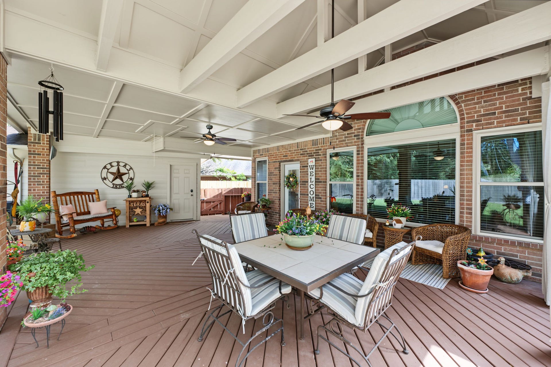 4807 Stonecrop Court, Houston, TX 77345 This section of the back patio has a vaulted ceiling and beams.