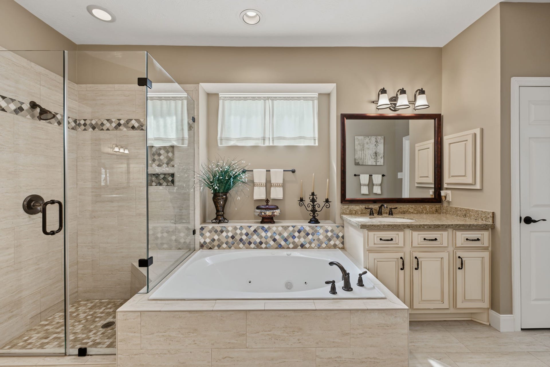 4807 Stonecrop Court, Houston, TX 77345 The Primary Bathroom has a separate shower and jetted tub area. His & Her closets too!