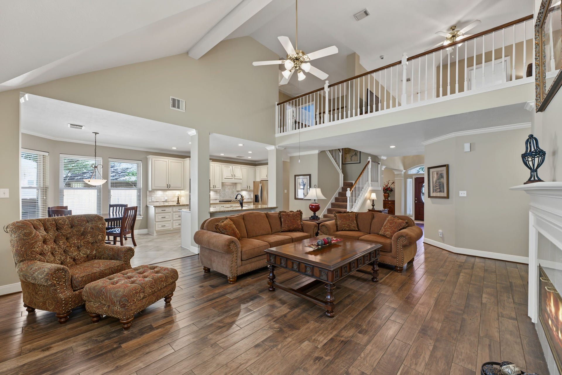 4807 Stonecrop Court, Houston, TX 77345 The Family Room is bathed in natural lighting and measures approx 22' x 17'.