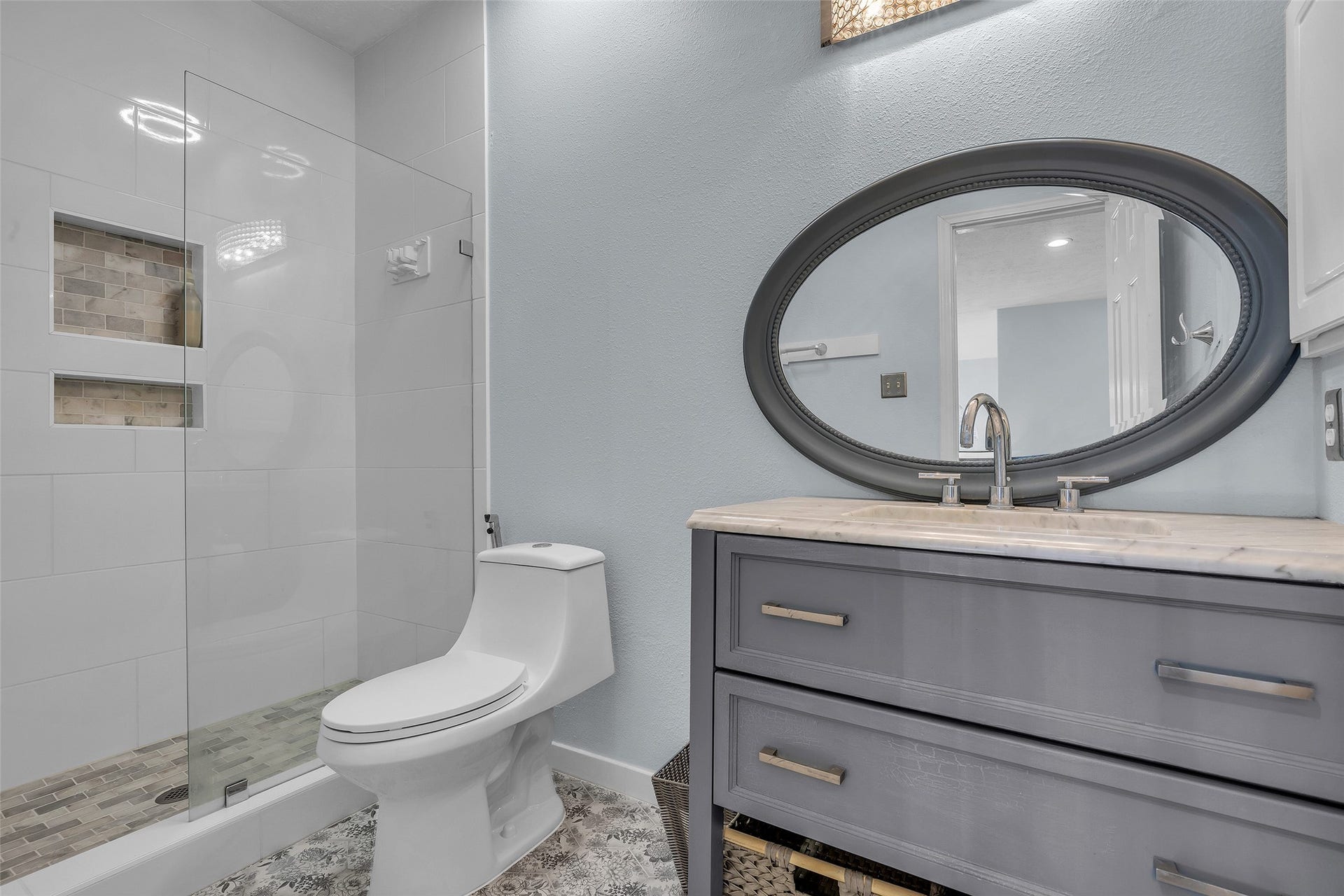 1408 S Friendswood Drive, #1301, Friendswood, TX 77546 Fully updated secondary shower is a stunner. Tile all the way up extending sight lines. Notice the new high end vanity.
