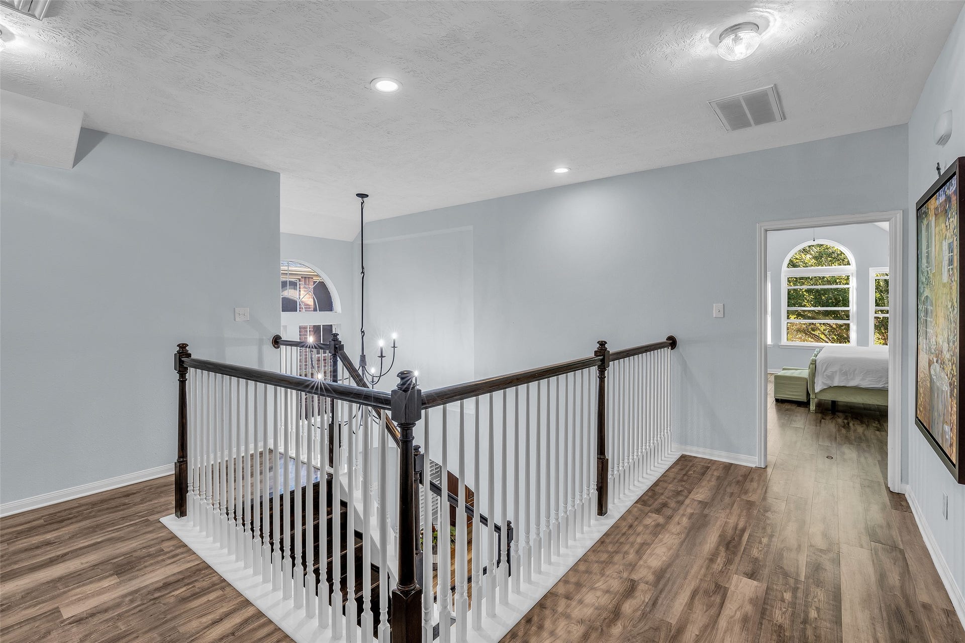 1408 S Friendswood Drive, #1301, Friendswood, TX 77546 Updated Oak staircase leads us upstairs