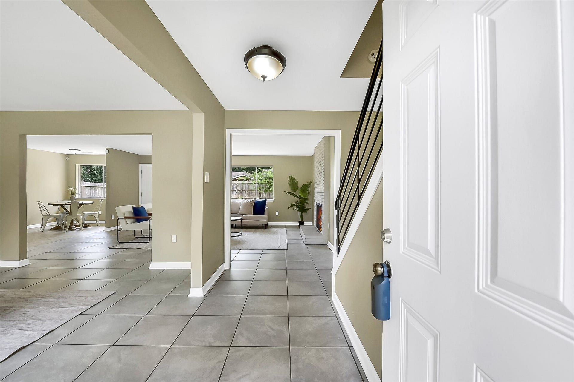 15503 Wandering Trail, Friendswood, TX 77546 Step inside to find fresh neutral paint, easy-maintenance tile flooring, and an open floorplan that flows seamlessly from the entry into the main living areas.