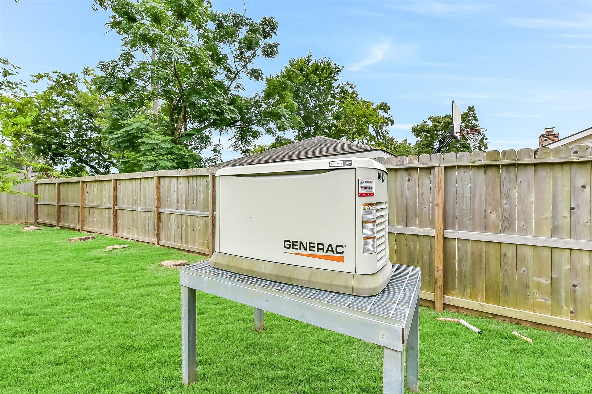 15503 Wandering Trail, Friendswood, TX 77546 A whole-home Generac backup generator provides peace of mind with reliable backup power.