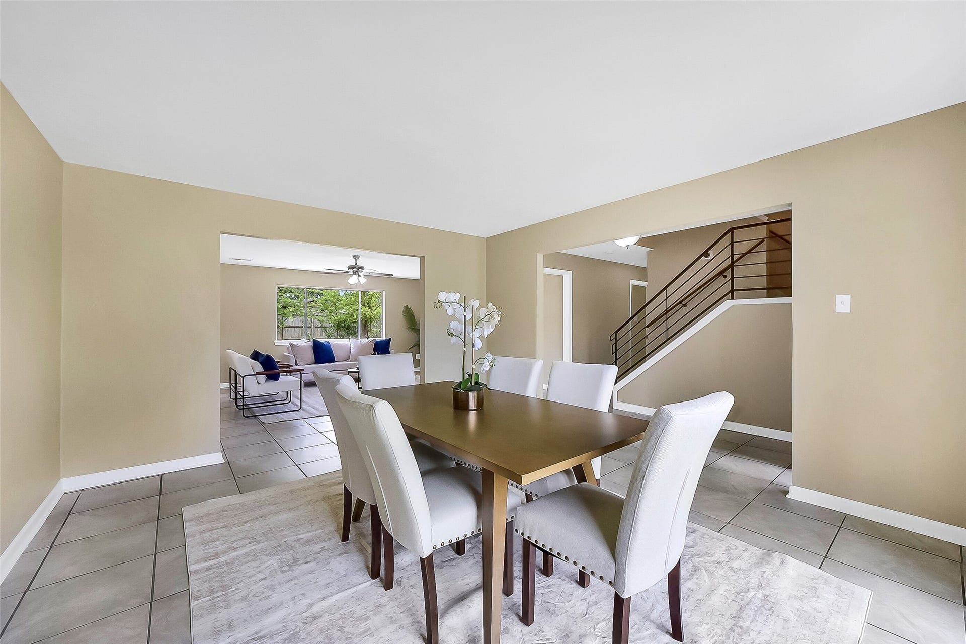 15503 Wandering Trail, Friendswood, TX 77546 The formal dining room features tile flooring, neutral paint, and a spacious layout that flows easily into the living room and foyer - making it the perfect home for gatherings and entertaining.