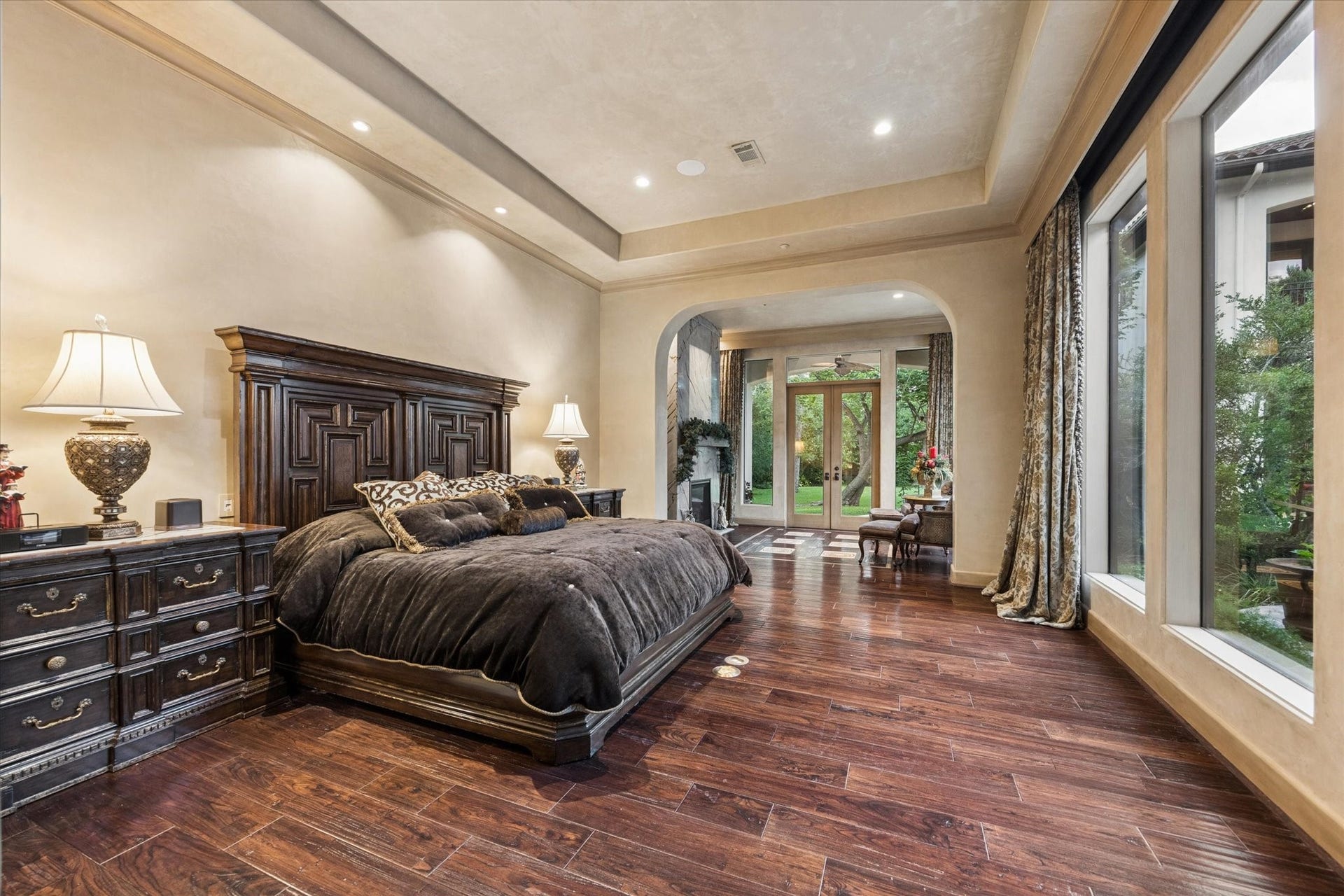 2 Lacewood Lane, Piney Point Village, TX 77024 Another view of the owners suite emphasizing its expansive layout, elegant ceiling detail, and private sitting retreat.
