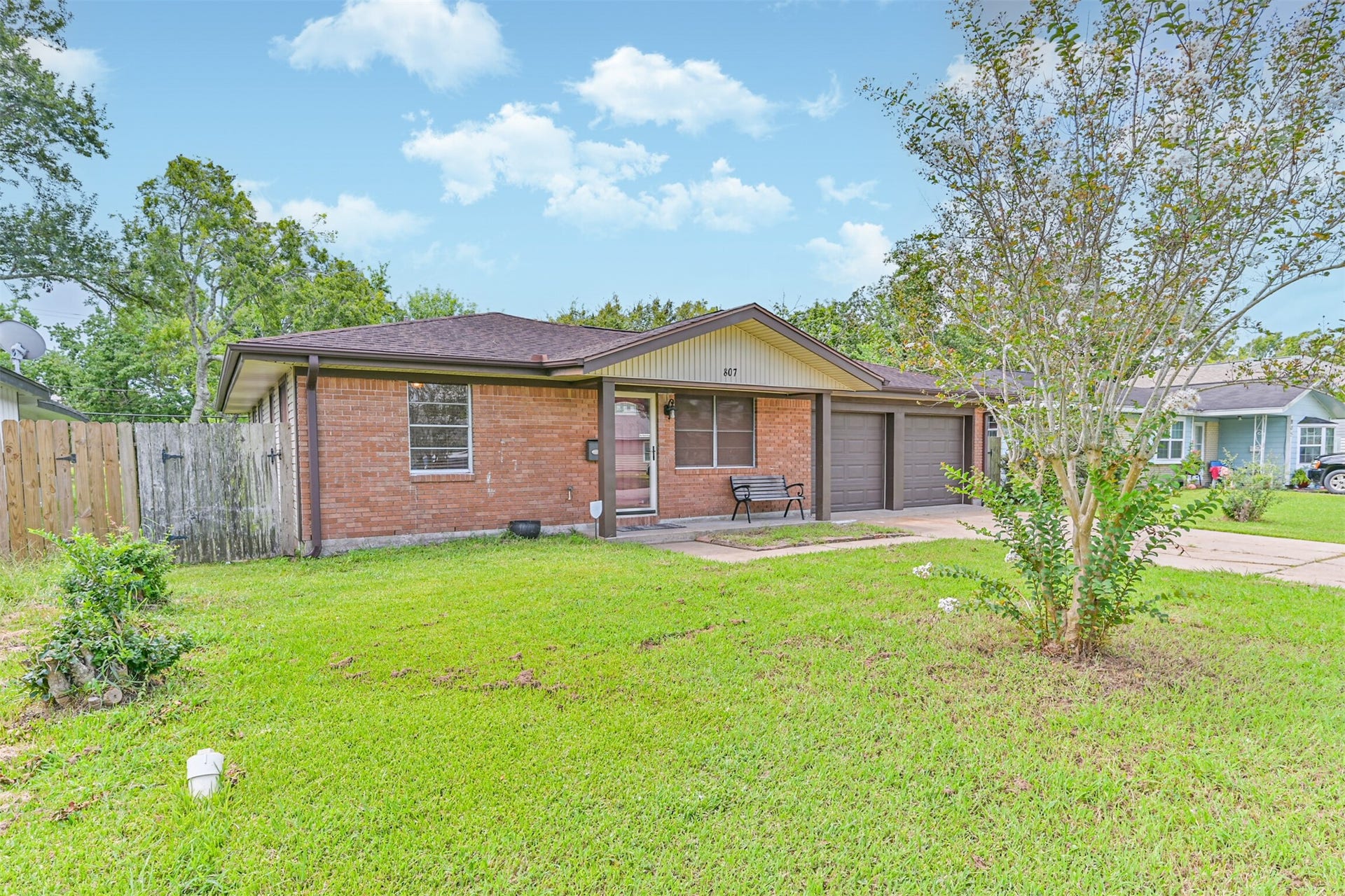 807 Temple Drive, Hitchcock, TX 77563 Side angle of front