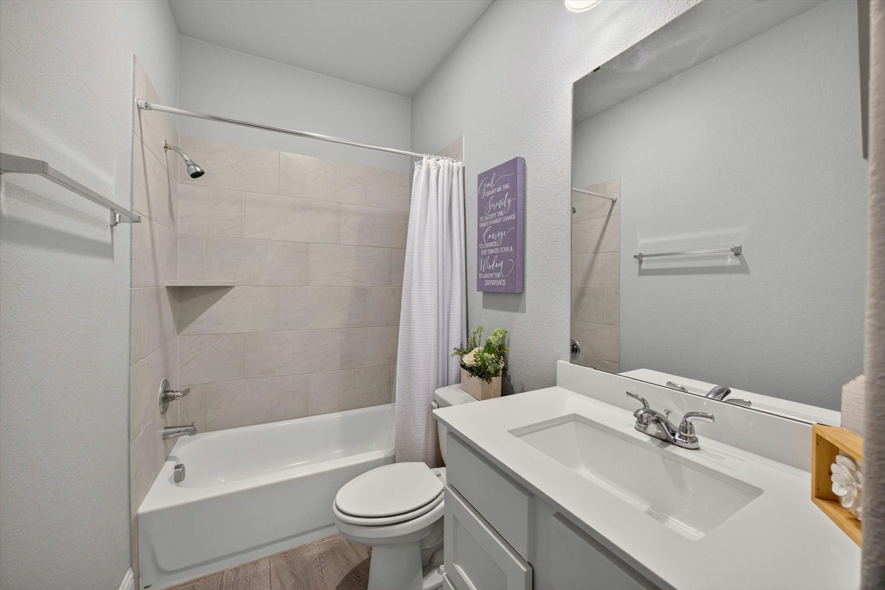 23026 Needlegrass Road, Katy, TX 77493 Full secondary bath with modern finishes.
