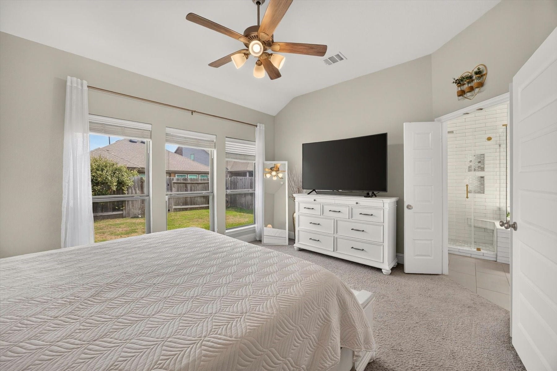 23026 Needlegrass Road, Katy, TX 77493 Primary retreat featuring a generous walk-in closet and ensuite bath.